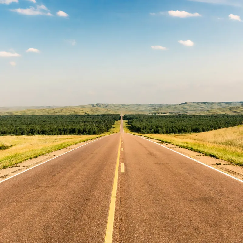 A straight open road representing clarity and direction.